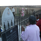 People visit the Viola Liuzzo memorial on the side of U.S. Highway 80 on March 7, 2015, in Lowndes County, Ala.